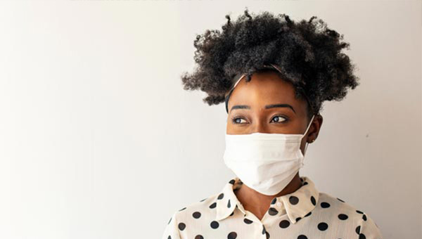 Photo of woman wearing face mask.